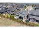 Aerial view of a well-maintained home with a backyard, patio, and surrounding neighborhood at 3575 White Rose Loop, Castle Rock, CO 80108