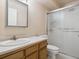 Bathroom featuring a vanity, toilet, and shower with glass doors at 13618 E Bethany Pl # 306, Aurora, CO 80014