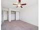 Bedroom with carpet and sliding-door closet at 13618 E Bethany Pl # 306, Aurora, CO 80014