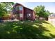 Spacious backyard with lush green lawn and fenced perimeter, great for outdoor activities at 5630 W 115Th Ave, Westminster, CO 80020