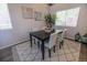 The Dining area includes a dark wood table, four chairs and decorative art at 5630 W 115Th Ave, Westminster, CO 80020
