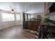 The Kitchen with an island, stainless steel appliances, and an open view to the living room at 5630 W 115Th Ave, Westminster, CO 80020