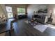 A Stylish living room featuring wood-look floors, abundant natural light, and contemporary decor at 5630 W 115Th Ave, Westminster, CO 80020
