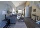A spacious living room, featuring a comfortable gray sofa and modern decor at 5630 W 115Th Ave, Westminster, CO 80020