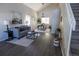 Bright and airy living room with hardwood floors, vaulted ceilings, and modern furniture at 5630 W 115Th Ave, Westminster, CO 80020