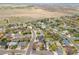 Neighborhood aerial view showcasing the property's location and proximity to amenities at 1535 Peach Ct, Brighton, CO 80601
