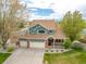Aerial view of a two-story home, showcasing the landscape at 1535 Peach Ct, Brighton, CO 80601