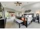 The primary bedroom is very large and features a decorative ceiling fan and modern decor at 4181 S Ivy Ln, Cherry Hills Village, CO 80111