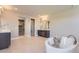 Open-concept bathroom featuring a soaking tub, vanity with dual sinks, and walk-in closet at 4769 Weitbrec Ln, Castle Rock, CO 80104