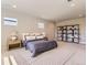 Serene main bedroom features scenic views, plush carpet, and a decorative bookshelf at 4769 Weitbrec Ln, Castle Rock, CO 80104
