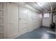 Clean basement area featuring storage options and a window for natural light at 1436 N Gilpin St # 2, Denver, CO 80218