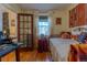 Comfortable bedroom featuring hardwood floors, natural light, and stylish accents at 1436 N Gilpin St # 2, Denver, CO 80218