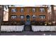 Charming brick home with well-maintained landscaping and a welcoming entrance at 1436 N Gilpin St # 2, Denver, CO 80218