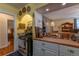 View of the kitchen area featuring stainless steel range and butcher block counter top at 1436 N Gilpin St # 2, Denver, CO 80218