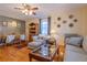 Cozy living room featuring hardwood floors, comfortable seating, and a dining area at 1436 N Gilpin St # 2, Denver, CO 80218