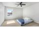 Neat bedroom with neutral carpet, a view, and closet for storage at 1482 S Pierson St # 75, Lakewood, CO 80232