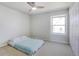 Clean bedroom with neutral carpet, good light, and closet space at 1482 S Pierson St # 75, Lakewood, CO 80232