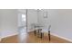 Cozy dining area with modern table, chairs, and stylish light fixture at 1482 S Pierson St # 75, Lakewood, CO 80232