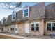 Charming brick townhouse with dormer windows and well-maintained landscaping at 1482 S Pierson St # 75, Lakewood, CO 80232