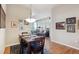 Cozy dining area with wood floors and stylish decor, perfect for entertaining at 7865 Vallagio Ln # 207, Englewood, CO 80112