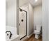 Clean and modern bathroom featuring a walk-in shower, subway tile and stylish fixtures at 9454 Yampa St, Commerce City, CO 80022