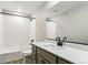 Modern bathroom featuring a shower-tub combo, and a quartz countertop at 9454 Yampa St, Commerce City, CO 80022