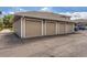 Attached garages with tan doors, convenient for parking and storage in this multi-Gathering home at 8481 W Union Ave # 2-103, Littleton, CO 80123