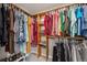Walk-in closet features shelving and plenty of storage for shoes and clothing at 12277 Krameria St, Brighton, CO 80602