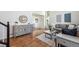 Inviting living room with hardwood floors, accent furniture, and plenty of natural light at 12277 Krameria St, Brighton, CO 80602