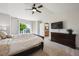Large main bedroom with vaulted ceiling and ensuite bathroom at 12277 Krameria St, Brighton, CO 80602