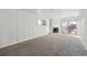 Finished basement with fireplace, carpet, ample space, and neutral paint tones at 8280 E 104Th Way, Henderson, CO 80640