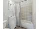 A full bathroom is equipped with a shower and tub combination with a shower curtain at 8280 E 104Th Way, Henderson, CO 80640