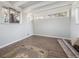 This bedroom features bright, natural light and beautiful wood laminate flooring at 8280 E 104Th Way, Henderson, CO 80640