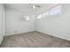 This bedroom features new carpet, neutral paint, and plenty of natural light at 8280 E 104Th Way, Henderson, CO 80640