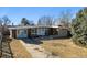 Exterior of brick home with nice yard at 8280 E 104Th Way, Henderson, CO 80640