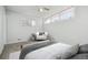 Serene primary bedroom featuring generous natural light, a ceiling fan, and neutral carpeting at 8280 E 104Th Way, Henderson, CO 80640