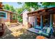 Charming backyard patio area with brick pavers and cozy seating at 807 9Th St, Golden, CO 80401