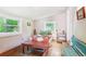 Bright bedroom with natural light, cozy decor, and hardwood floors, creating a comfortable and inviting space at 807 9Th St, Golden, CO 80401
