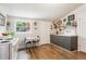 Bright kitchen with ample storage, laminate floors, and double door entryway at 807 9Th St, Golden, CO 80401