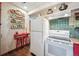 Rustic kitchen featuring unique tile backsplash, decorative plates and painted wood accents at 807 9Th St, Golden, CO 80401