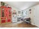 Traditional kitchen with colorful cabinetry, white appliances, and bright natural light at 807 9Th St, Golden, CO 80401