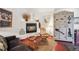 Unique living room with rustic decor, fireplace, and eye-catching wardrobe at 807 9Th St, Golden, CO 80401