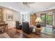 Comfortable living room featuring hardwood floors, armchairs, and access to a deck at 807 9Th St, Golden, CO 80401