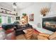 Charming living room with a fireplace, comfortable seating, and unique decor that creates a relaxing atmosphere at 807 9Th St, Golden, CO 80401