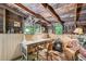 Rustic office space with wood paneling, a desk, an accent rug, and cozy decor at 807 9Th St, Golden, CO 80401