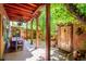 Inviting outdoor patio features a covered dining area and access to a beautifully landscaped garden at 807 9Th St, Golden, CO 80401