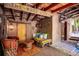 Charming patio featuring colorful seating, a decorative rug, and unique architectural details at 807 9Th St, Golden, CO 80401