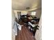 Cluttered room with storage bins and scattered items, presenting a chance for organization and personalization at 1489 Arapahoe St, Strasburg, CO 80136