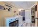 Bathroom with shower, washer, and dryer hookups offers convenience at 6311 Xavier St, Arvada, CO 80003