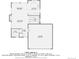Detailed floor plan showcasing layout of the first floor with kitchen, living room, dining area, foyer, and garage at 6311 Xavier St, Arvada, CO 80003